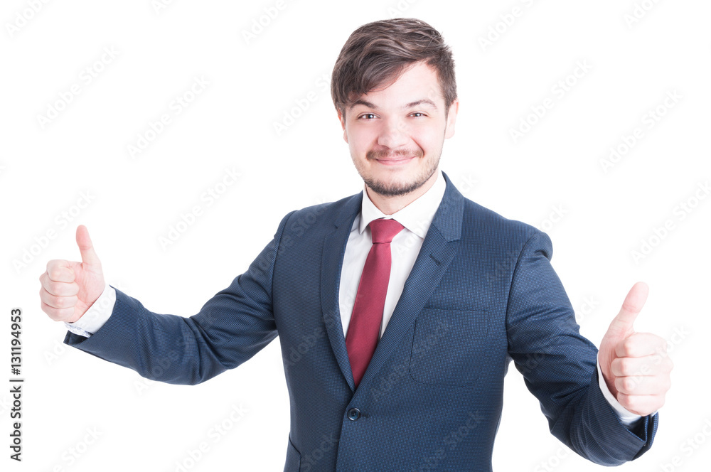 Smiling man in suit showing thumbs up Smiling man in suit showing thumbs up