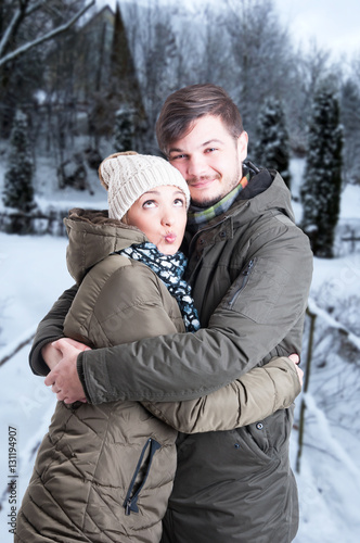 Young couple hugging in winter weather