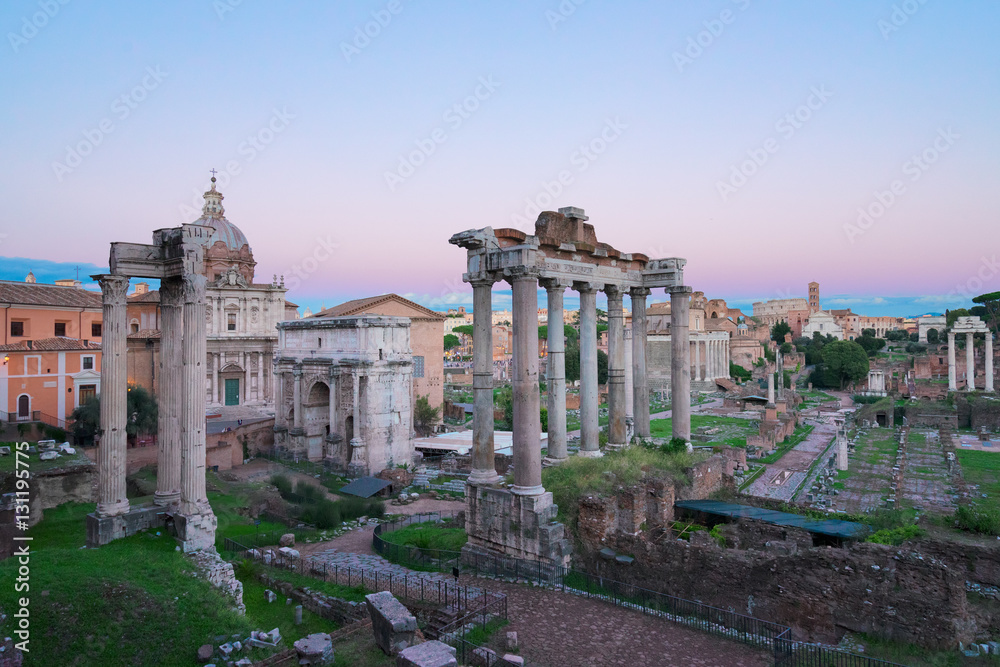 Naklejka premium Roman Forum - ancient ruins in Rome at twilight, Italy