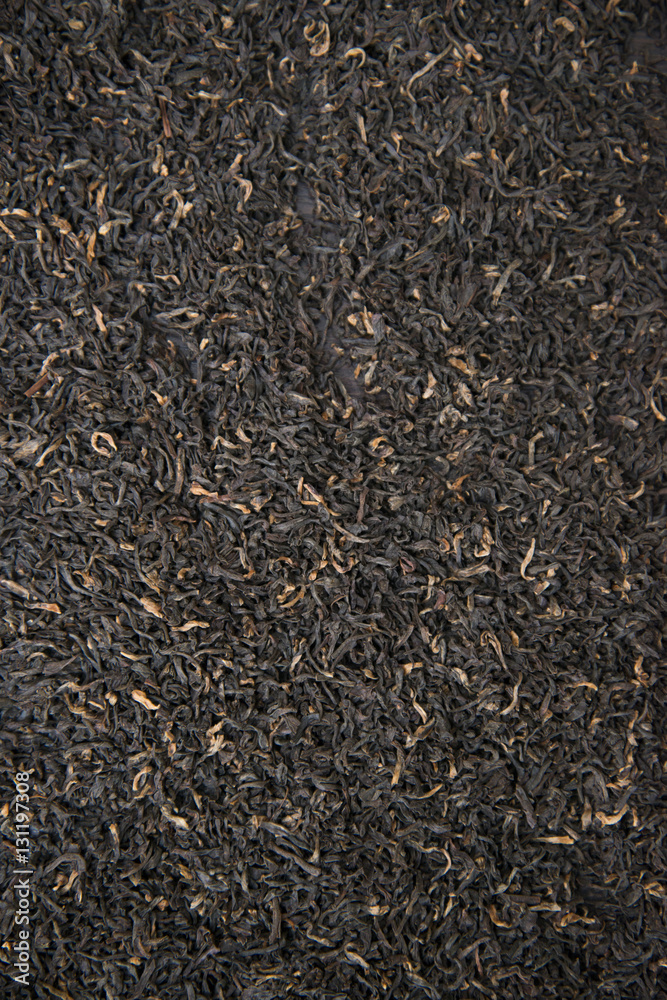 Indian black tea scattered on the table. Indian black tea scattered on the table.