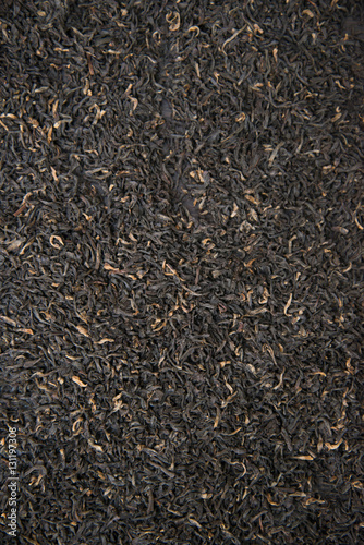 Indian black tea scattered on the table.