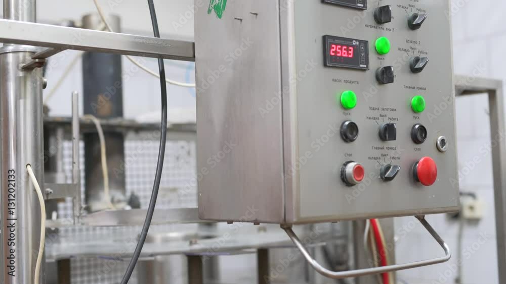 View of electrical cabinet at dairy plant at work View of electrical cabinet at dairy plant at work