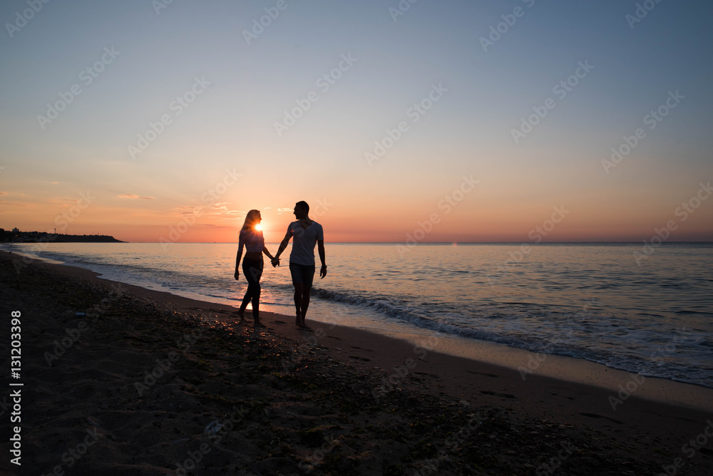 Fototapeta premium loving couple on the beach