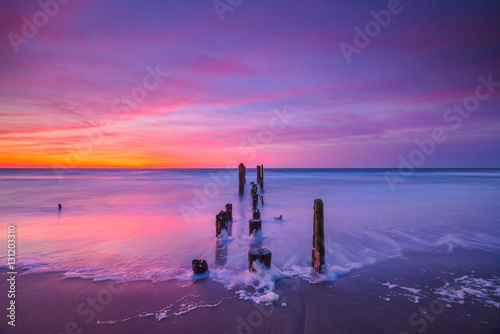 Fototapeta Naklejka Na Ścianę i Meble -  Seascape sunrise with vibrant clouds 