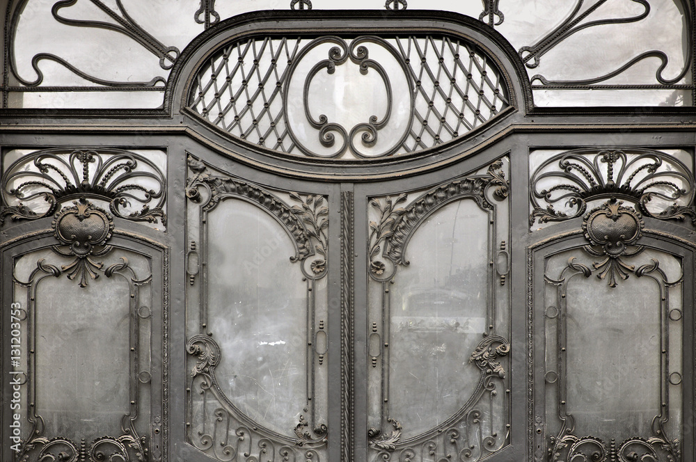 The entrance door to the Art Nouveau style. Elegant metal