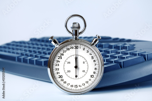 Stopwatch and computer keyboard.