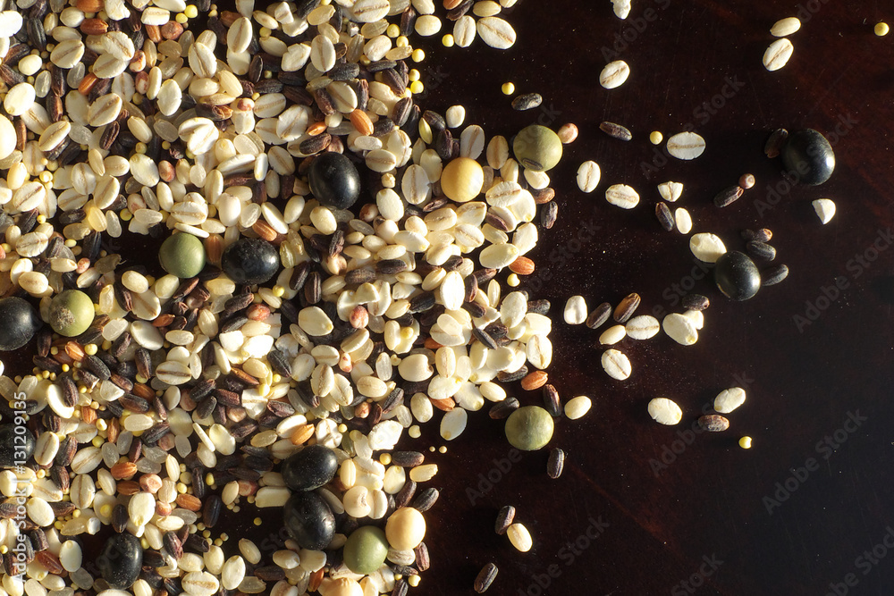 Fototapeta premium Cereals and beans on wood background