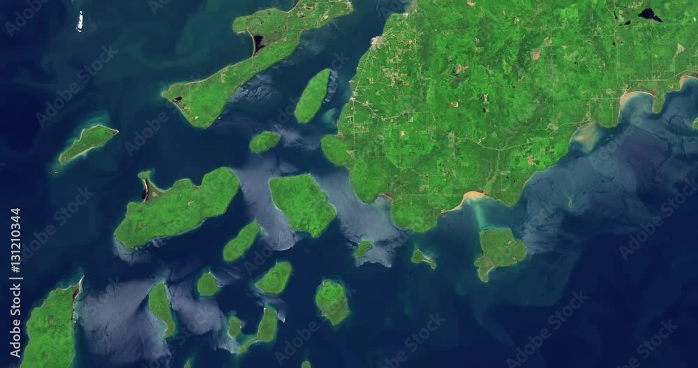 High-altitude overflight aerial of shores and waters of Lake Superior, summer. Clip loops and is reversible. Elements of this image furnished by USGS/NASA Landsat High-altitude overflight aerial of shores and waters of Lake Superior, summer. Clip loops and is reversible. Elements of this image furnished by USGS/NASA Landsat