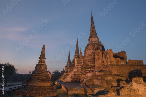 Ancient ruins of the temple Wat Phra Sri Sanphet national historic site with lights show at twilight time in Ayutthaya  Thailand.