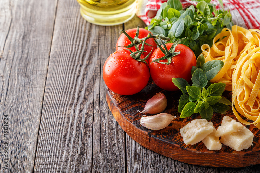 Cutting board with ingredients, selective focus.