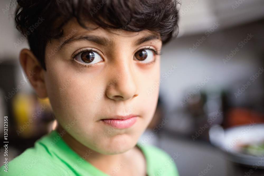 Portrait of boy in kitchen at home Portrait of boy in kitchen at home