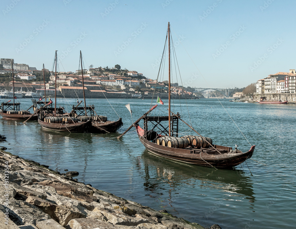Douro river and traditional boats with wine barrels - Porto, Portugal