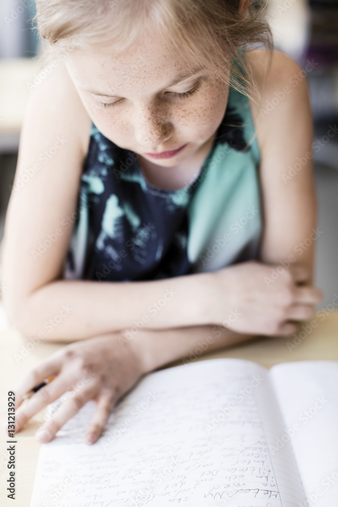 Portrait of girl reading book Portrait of girl reading book