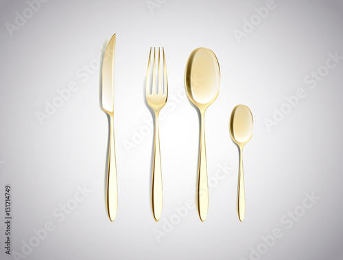 Cutlery Set of Golden Forks Spoons and Knifes Top View Isolated