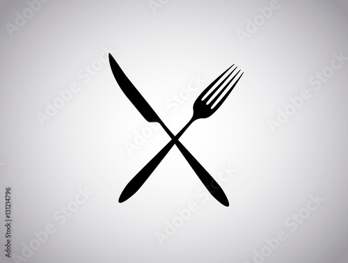 Knife and fork silhouettes crossed, isolated on white background