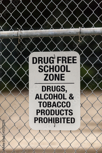 Warning sign on school wire fence, Seldovia, Kachemak Bay, Alaska, USA photo