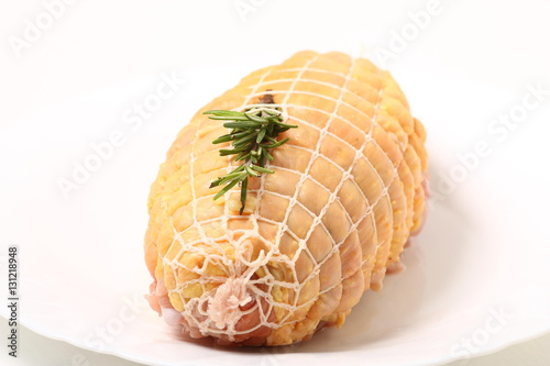 Foto Arrosto di pollo crudo