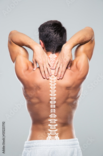Принти на полотні Back view portrait of a man with neck pain