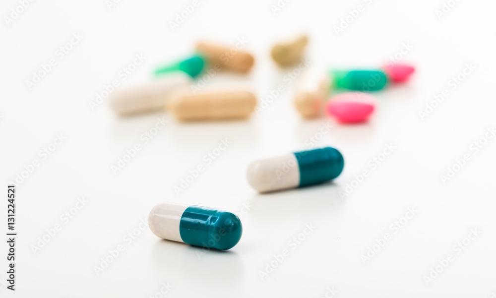 Pills on white background