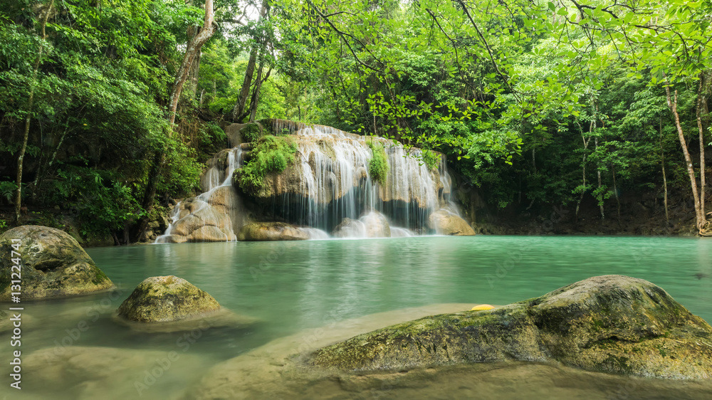 Naklejka premium Beautiful and Breathtaking green waterfall, Erawan's waterfall Located Kanchanaburi province, Thailand