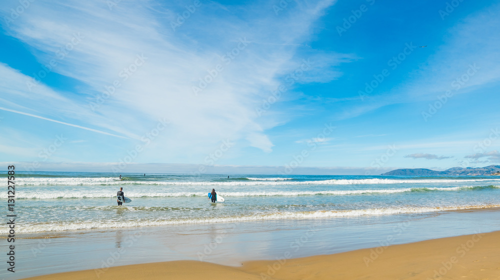 Surfers in Pismo Beach