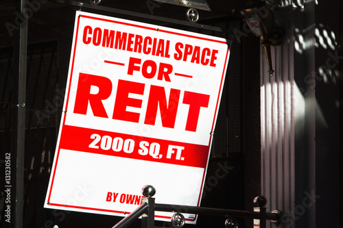 Close up of rental sign outside commercial building photo