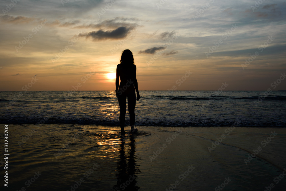 Girls sadow on the beach