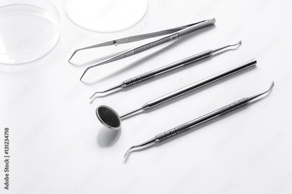 dental tools on white background close up dental tools on white background close up