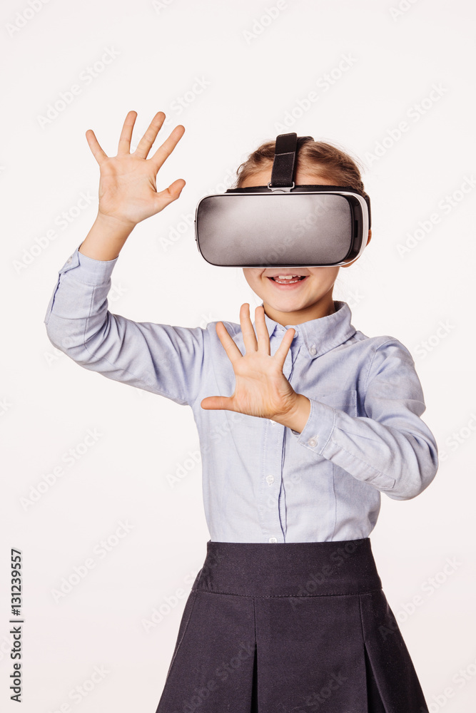schoolgirl with virtual reality headset. Innovation technology 