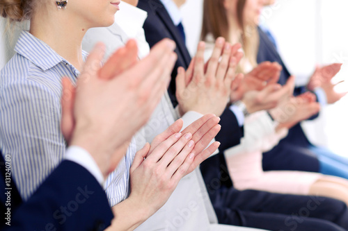 Close up of business people hands  clapping at conference © rogerphoto