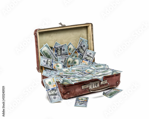 Open old vintage suitcase full of money, business concept