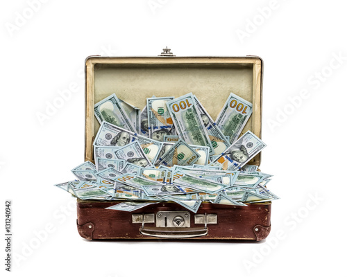 Open old vintage suitcase full of money, business concept