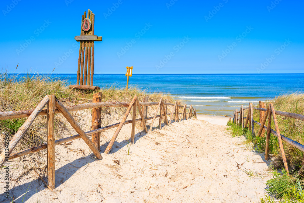 Entrance to sandy beach on coast of Baltic Sea near Lubiatowo village ...