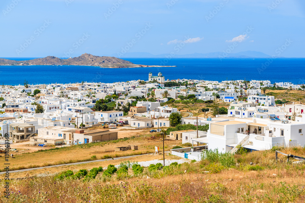 View of Naoussa village and blue sea in background, Paros island, Greece