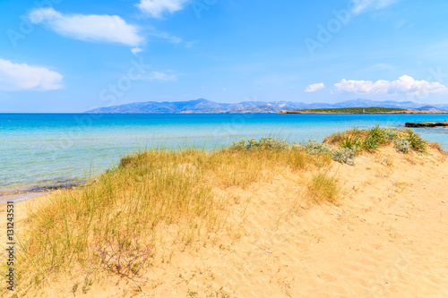 View of beautiful sandy Santa Maria beach with azure sea water on coast of Paros island  Greece