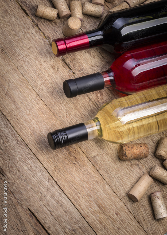Glass bottle of wine with corks
