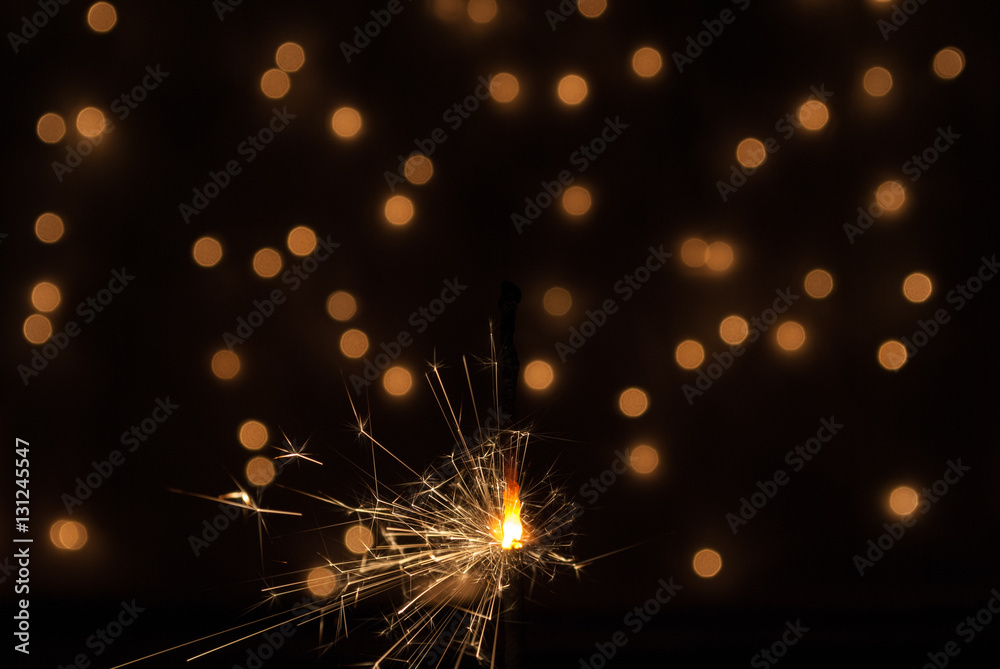 Obraz premium Christmas Background. Christmas Lights. The sparklers. Bengal li