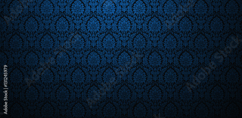 Fragment of ornamental wallpaper turquoise blue navy green colored , or abstract surface of tiled flowers and leaves  pattern, or texture useful as a background vignetted and gradient background