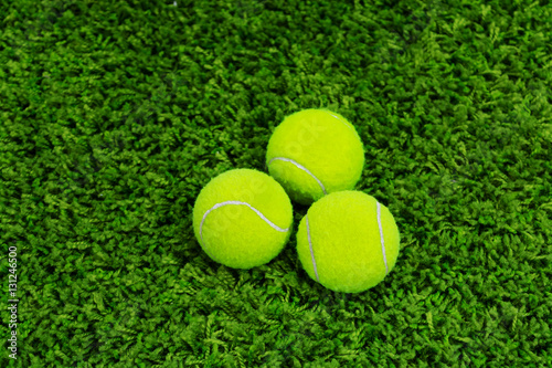 Close up of tennis ball on grass © Руслан Галиуллин