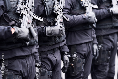 Soldier with machine gun during military parade