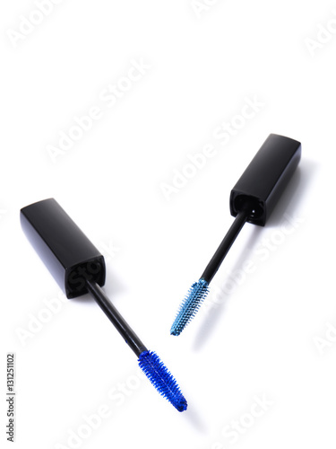 Two tone blue mascara brush on background