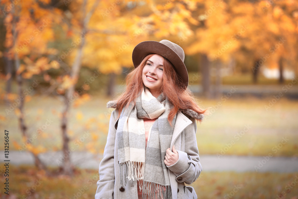 Beautiful young woman in a autumn park Beautiful young woman in a autumn park