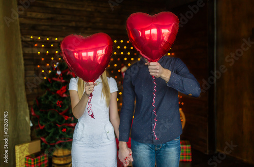 Obraz na płótnie Happy couple with balloons instead of a head have fund w salonie
