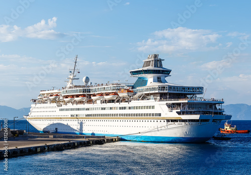 big white cruise ship in the port of the island  Rhodes Greece © vladimircaribb