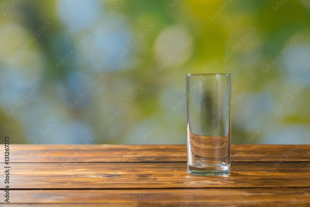 Empty glass on wooden table outdoor Empty glass on wooden table outdoor