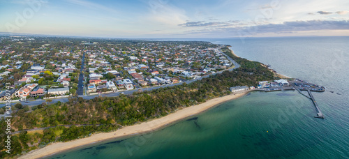 Aerial panorama of Black Rock suburban area,  coastline, pier and wharf at sunset. Melbourne, Victoria, Australia