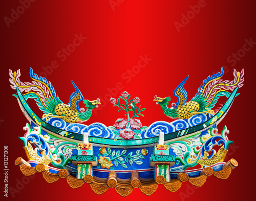 chinese phoenix statue on the red background.