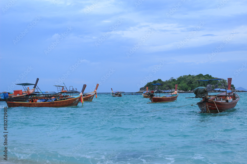 Fishing Boats in the sea in the morning at Koh Lipeh Andaman Sea Fishing Boats in the sea in the morning at Koh Lipeh Andaman Sea