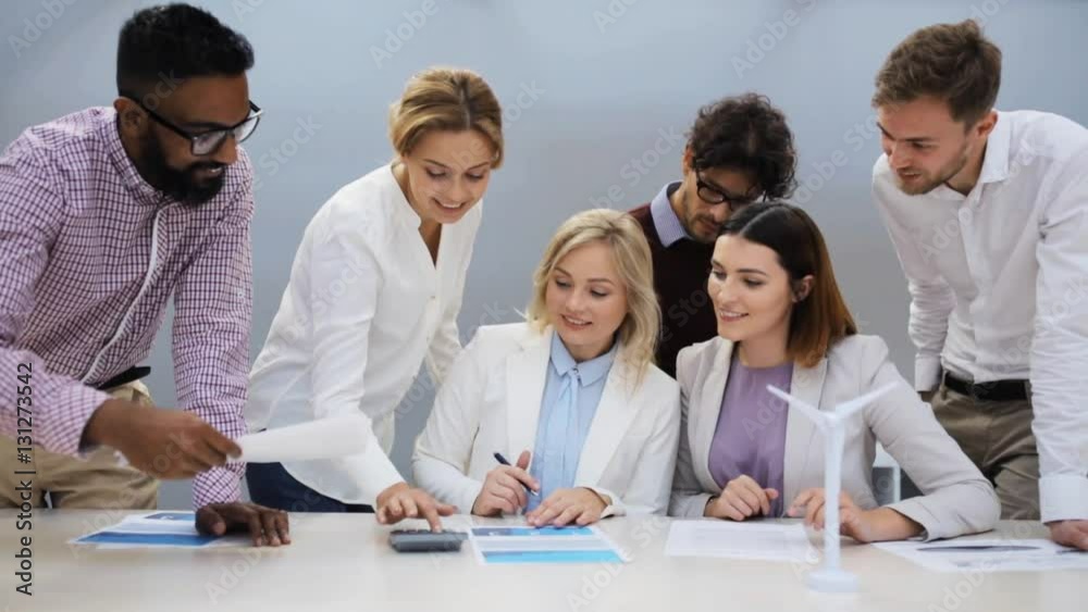 business team discussing green energy project business team discussing green energy project