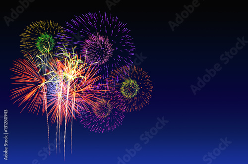 Fireworks celebration and the city night light background.